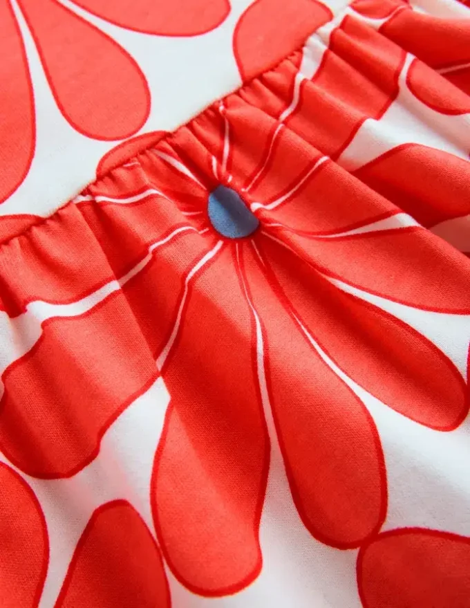 Ariel Twirly Jersey Dress Coral Orange Giant Daisy
