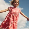 Ariel Twirly Jersey Dress Coral Orange Giant Daisy