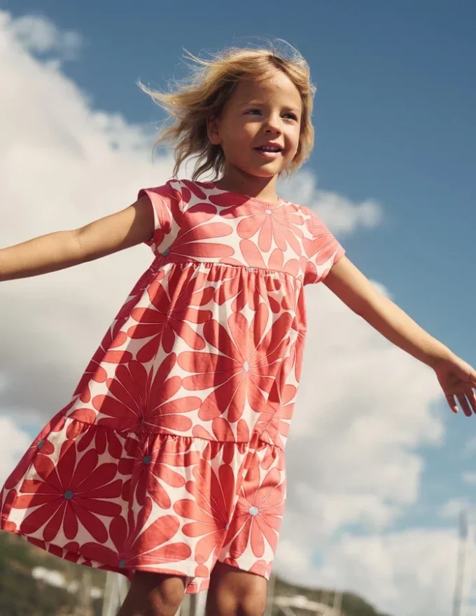 Ariel Twirly Jersey Dress Coral Orange Giant Daisy