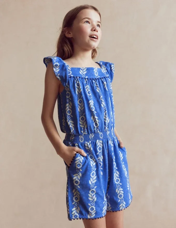 Ciara Pom Trim Jersey Romper Blue Floral Ciara Pom Trim Jersey Romper Blue Floral