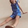 Ciara Pom Trim Jersey Romper Blue Floral Ciara Pom Trim Jersey Romper Blue Floral
