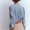 Embroidered Trim Interest Top Chambray Embroidered Trim Interest Top Chambray