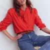 Emily Pom Trim Ruffle Shirt Blood Orange Emily Pom Trim Ruffle Shirt Blood Orange