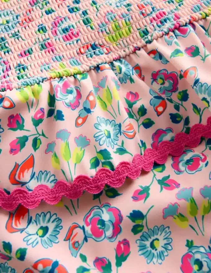 Peplum Smocked Swimsuit Chalk Pink Butterfly Floral Peplum Smocked Swimsuit Chalk Pink Butterfly Floral